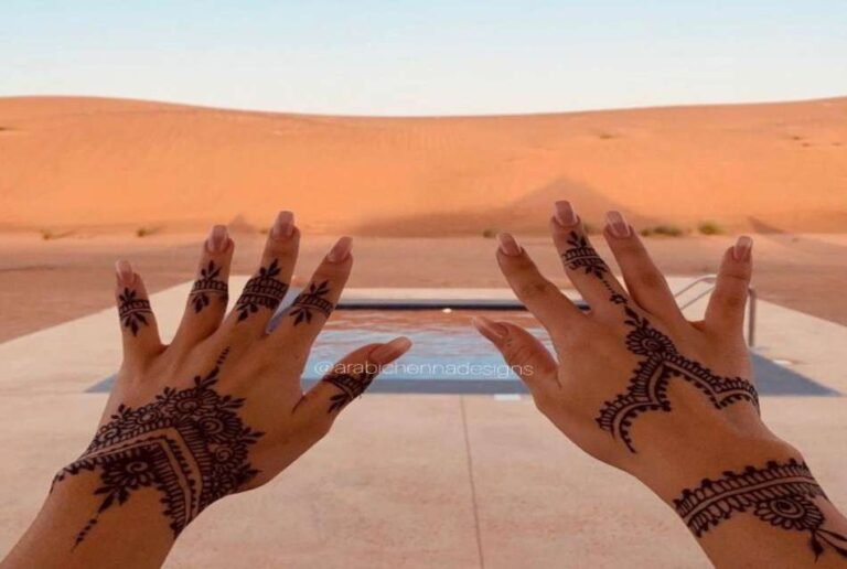 henna painting in desert safari